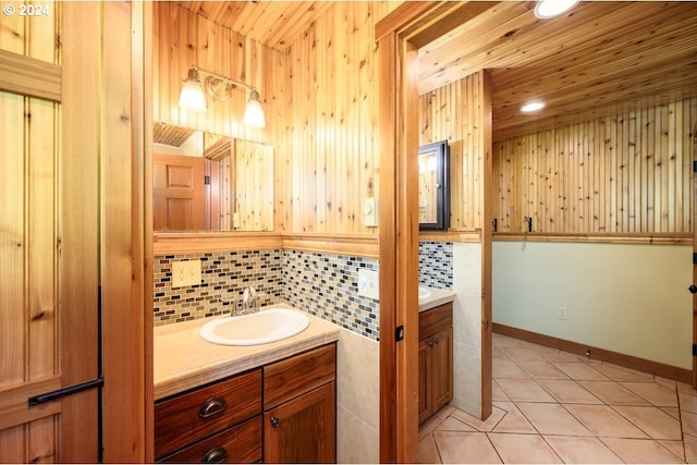 26231 SW Thunderhead Ln, Sheridan, OR 97378 - bathroom with vanity, tile patterned floors, tasteful backsplash, and wooden ceiling