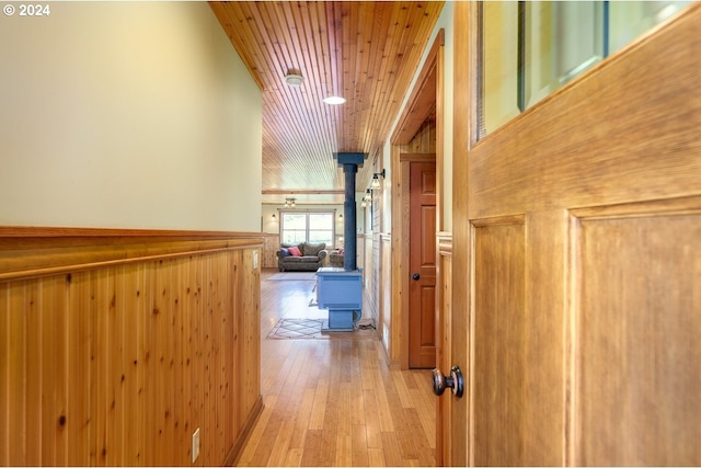 26231 SW Thunderhead Ln, Sheridan, OR 97378 - corridor with wood ceiling, light wood-type flooring, and wooden walls