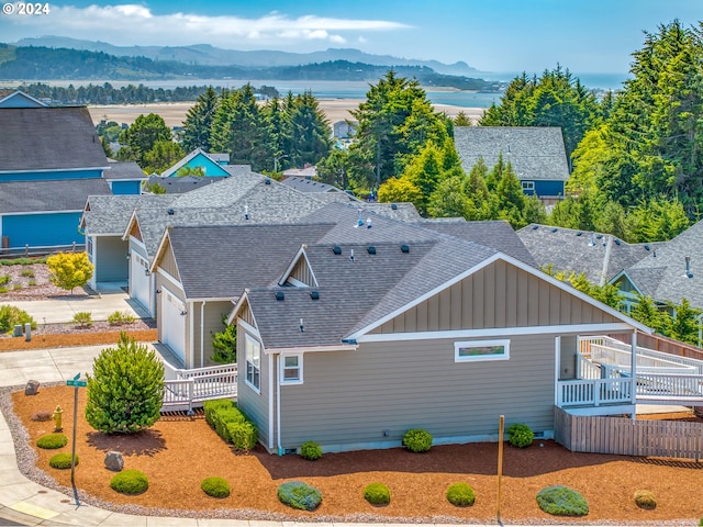 birds eye view of property featuring a mountain view