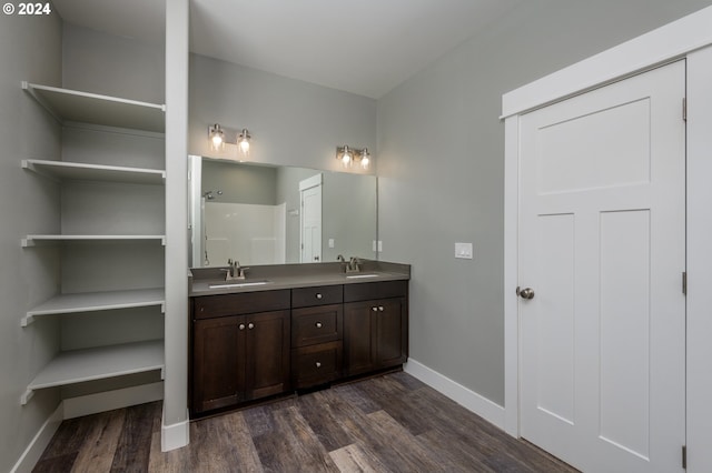 bathroom featuring vanity and hardwood / wood-style floors