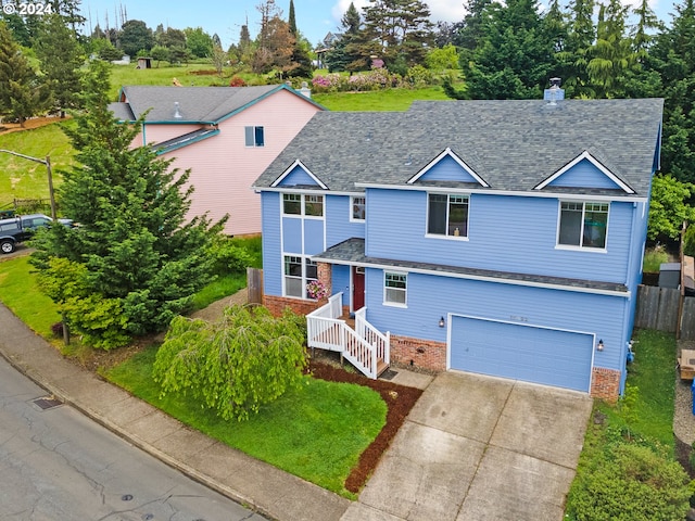 view of front of property featuring a garage