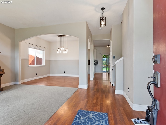 foyer entrance featuring dark hardwood / wood-style flooring