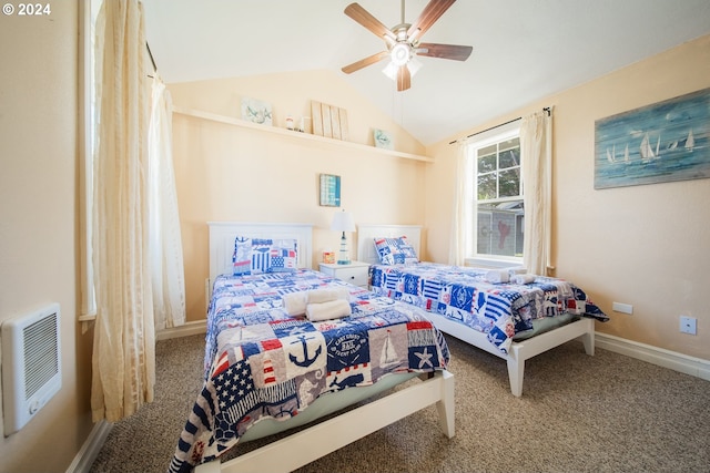 carpeted bedroom featuring heating unit, vaulted ceiling, and ceiling fan