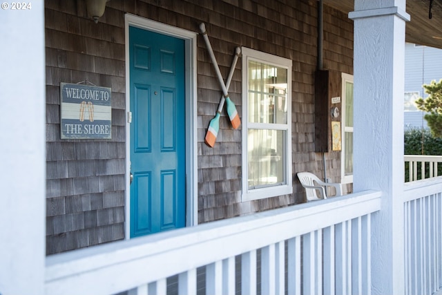 doorway to property with a porch