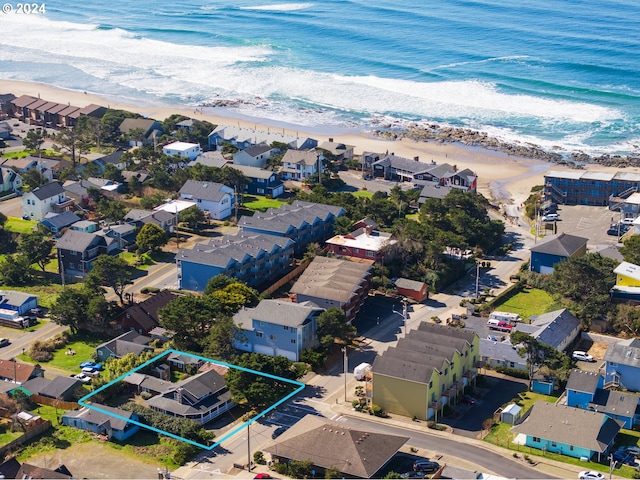 aerial view with a view of the beach and a water view