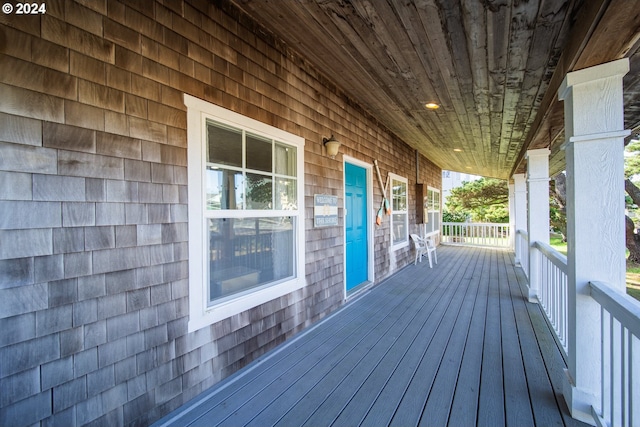 wooden deck featuring covered porch