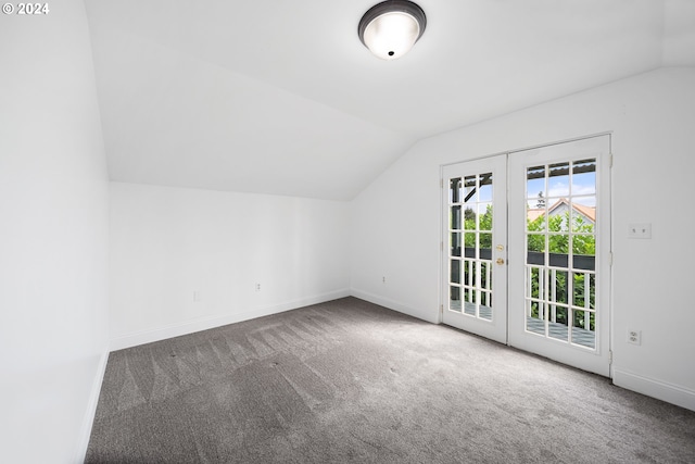 bonus room with french doors, lofted ceiling, and carpet flooring