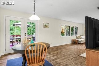 dining room with hardwood / wood-style floors