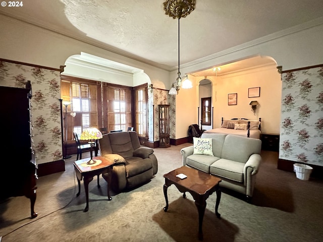 carpeted living room featuring a textured ceiling and ornamental molding