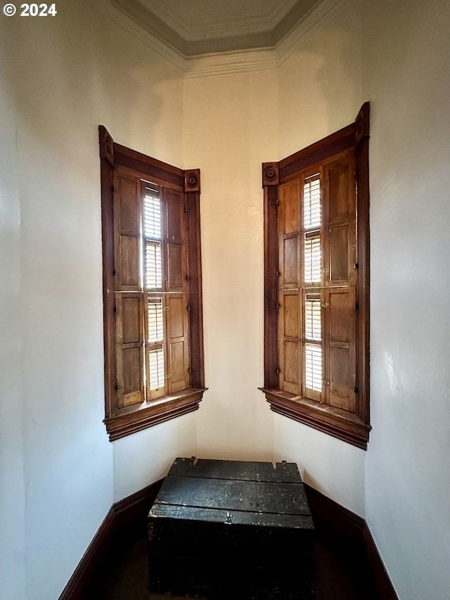 interior space featuring ornamental molding