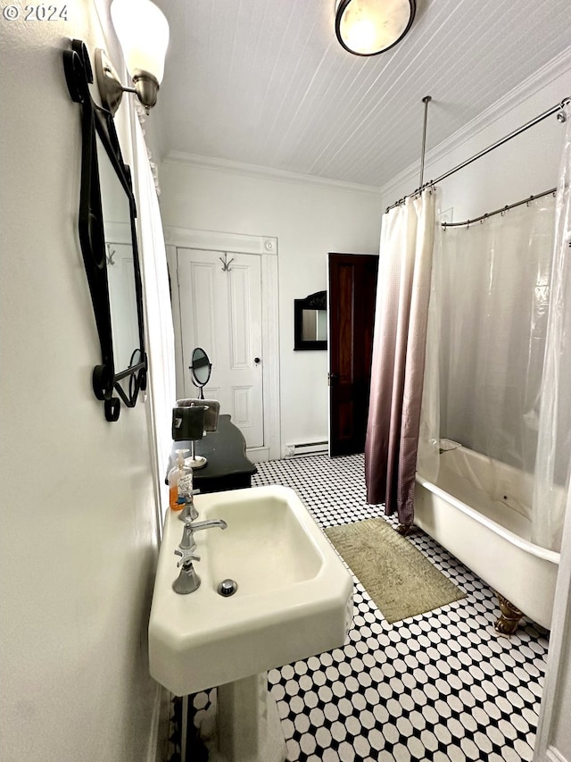 bathroom with a baseboard heating unit, sink, crown molding, and shower / tub combo with curtain