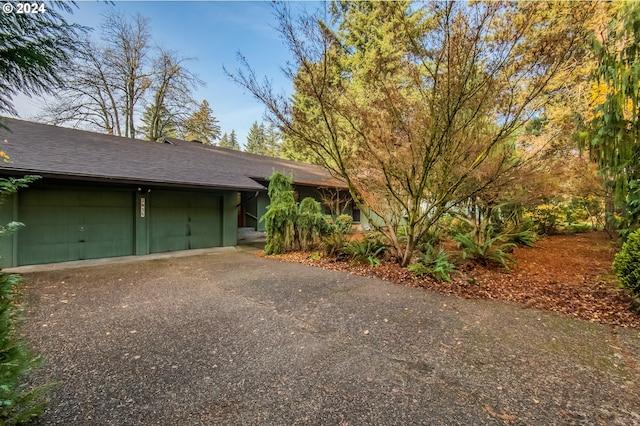 view of front of home with a garage