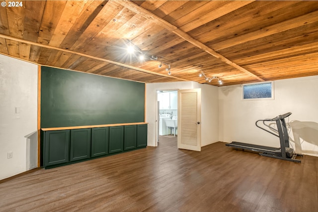 basement with wood-type flooring, track lighting, and wooden ceiling