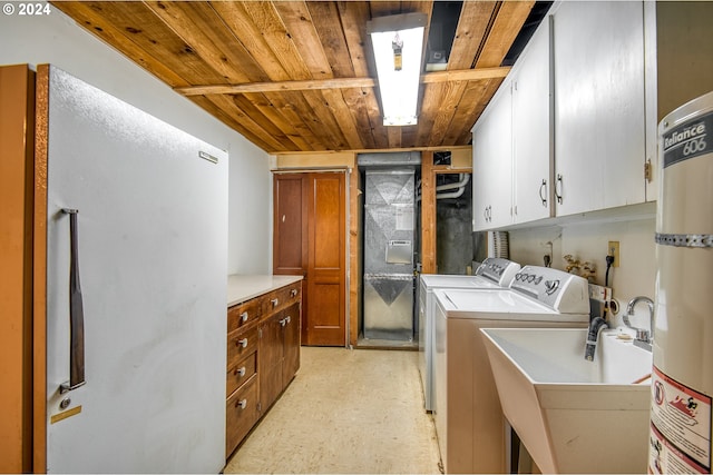 washroom with cabinets, separate washer and dryer, wooden ceiling, and sink