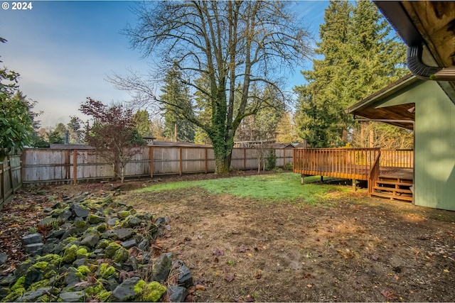 view of yard featuring a deck