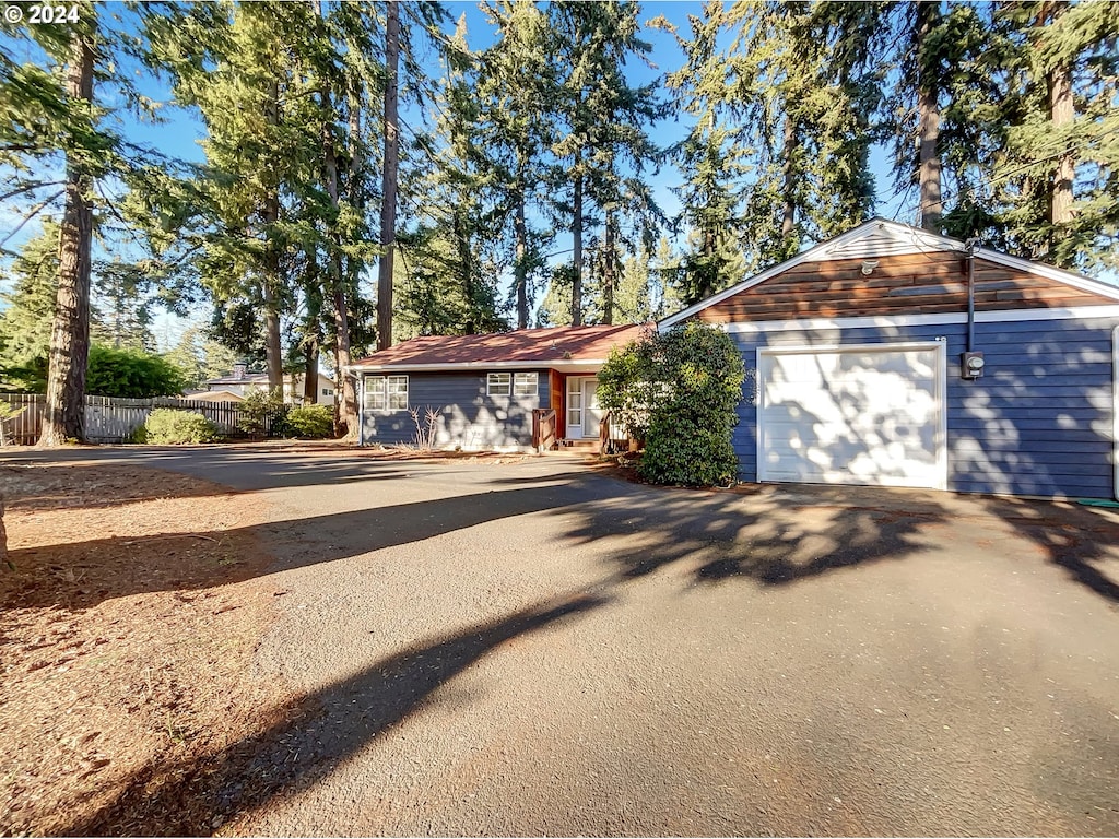 view of front of home with an outbuilding