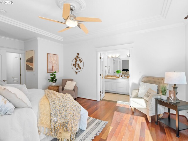 unfurnished room featuring hardwood / wood-style floors, ceiling fan, and ornamental molding