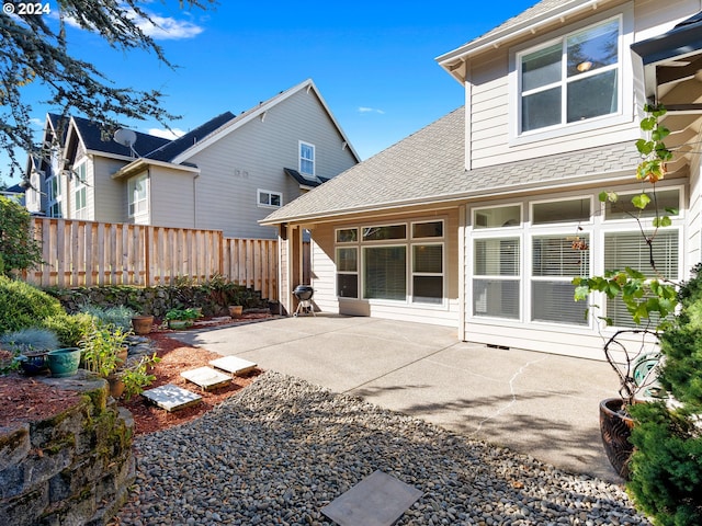 rear view of house with a patio