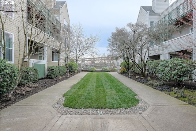 surrounding community with a lawn