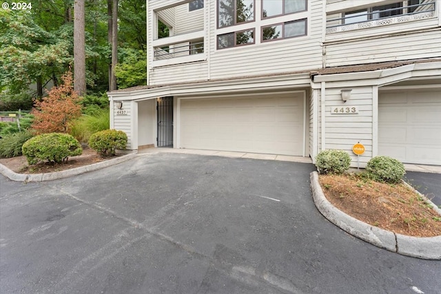 exterior space with a garage