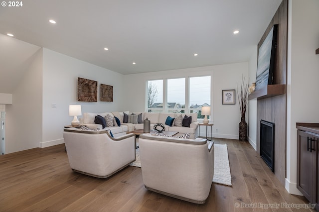 living room with light hardwood / wood-style floors