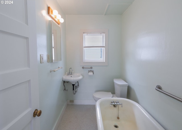 bathroom with toilet and a bath