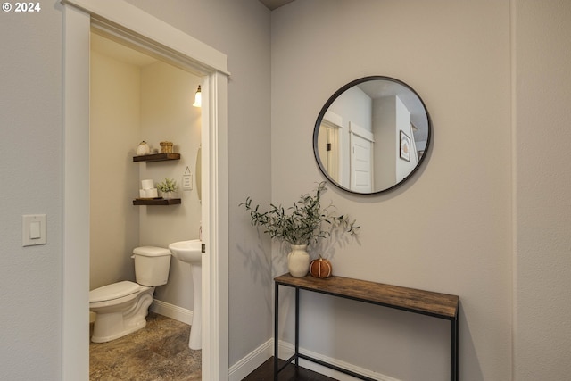 bathroom featuring tile patterned floors and toilet