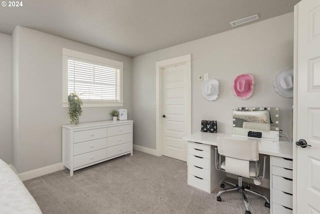 view of carpeted office space