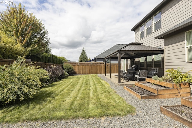 view of yard featuring a patio area and a gazebo