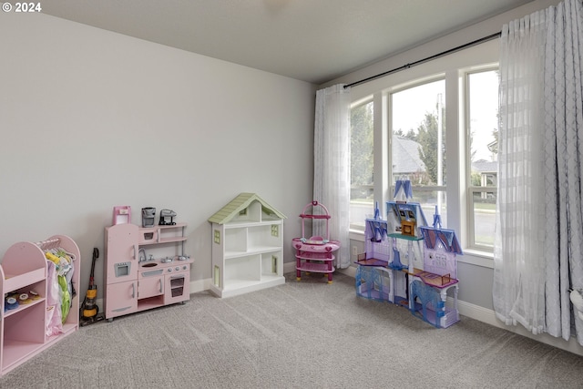 playroom with plenty of natural light and light carpet