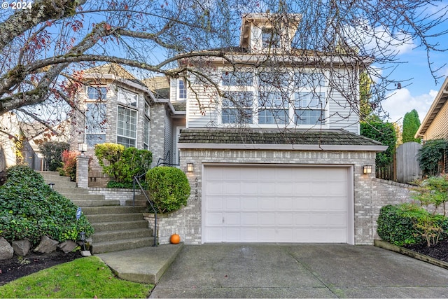 view of front of home with a garage