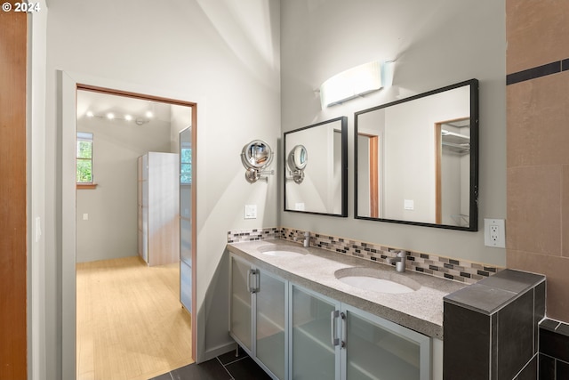 bathroom with vanity and wood-type flooring