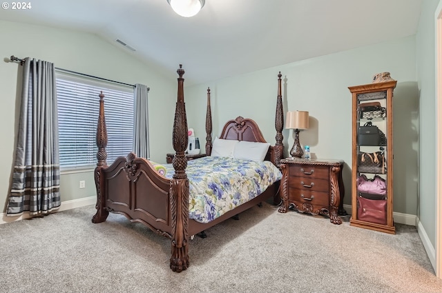 carpeted bedroom featuring vaulted ceiling