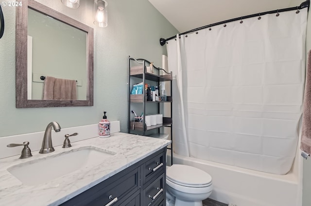 full bathroom with toilet, shower / bath combo, and vanity