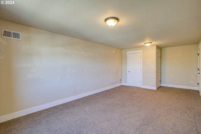 empty room with carpet floors