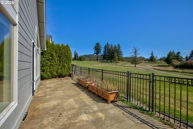 view of patio / terrace featuring a rural view