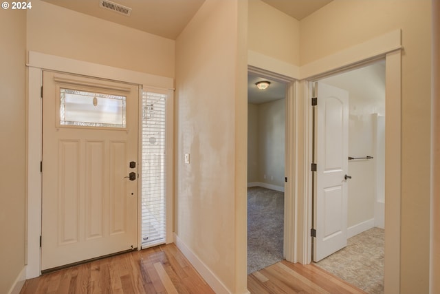 foyer entrance featuring light hardwood / wood-style flooring