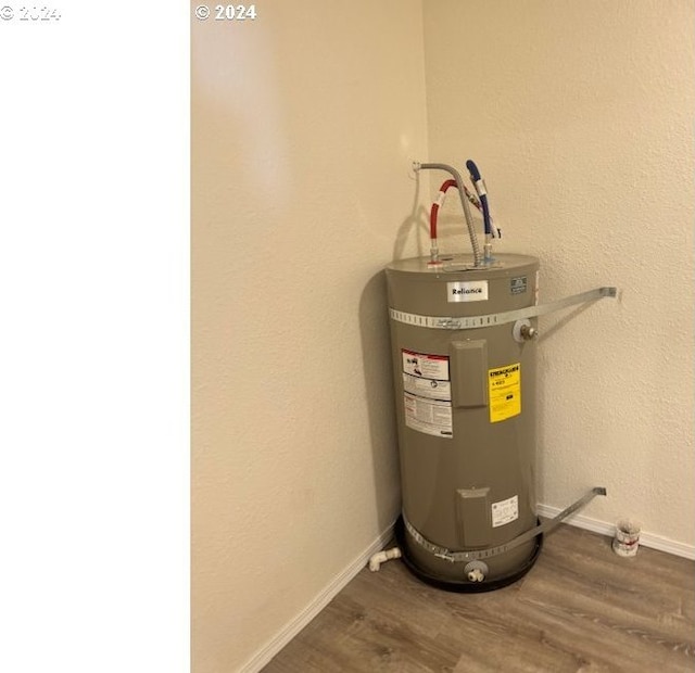 utility room with secured water heater