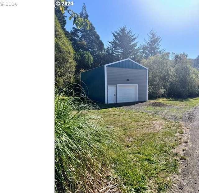 view of outdoor structure featuring a garage