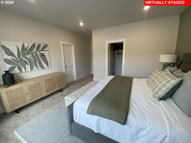 walk in closet featuring carpet flooring