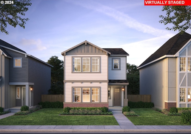 view of front facade featuring a front lawn