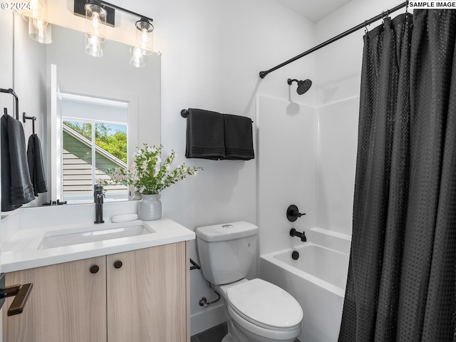 full bathroom featuring vanity, toilet, and shower / bath combo