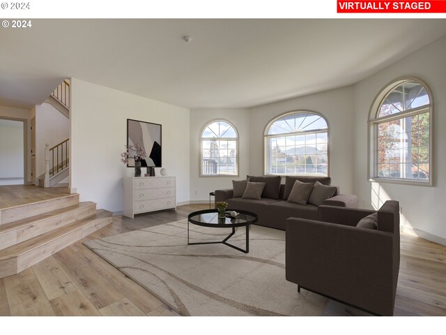 1381 Echo Dr, Roseburg, OR 97470 - living room with wood finished floors, stairs, and baseboards