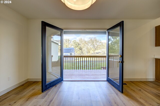 1381 Echo Dr, Roseburg, OR 97470 - doorway to outside with wood finished floors, baseboards, and french doors