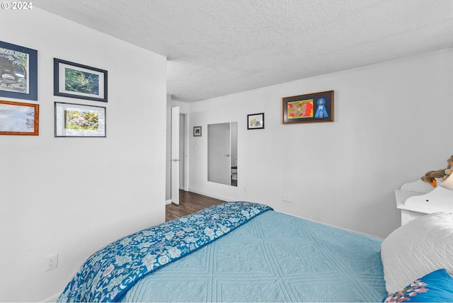bedroom with a textured ceiling