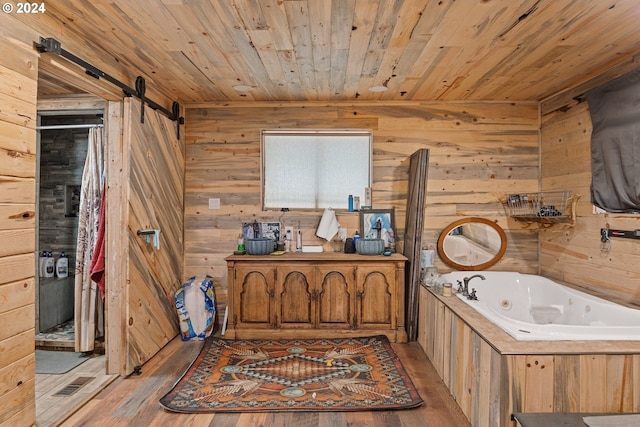 bathroom featuring hardwood / wood-style flooring, wood walls, wood ceiling, and a tub to relax in