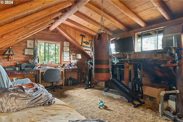 interior space featuring carpet flooring, wood walls, wood ceiling, and multiple windows