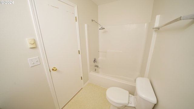 bathroom with toilet and shower / washtub combination