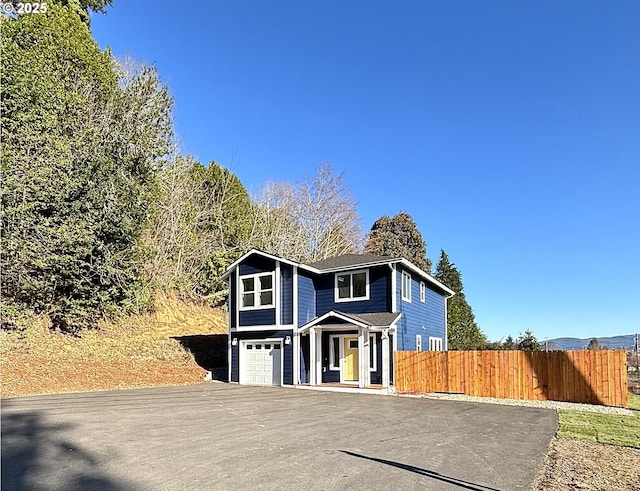 view of front of property with a garage