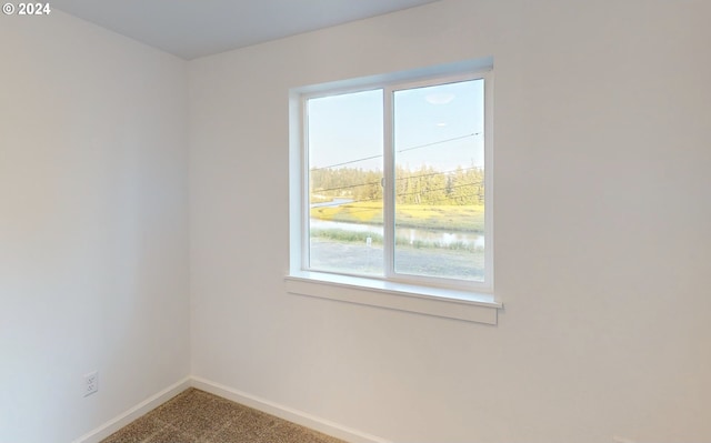 view of carpeted spare room